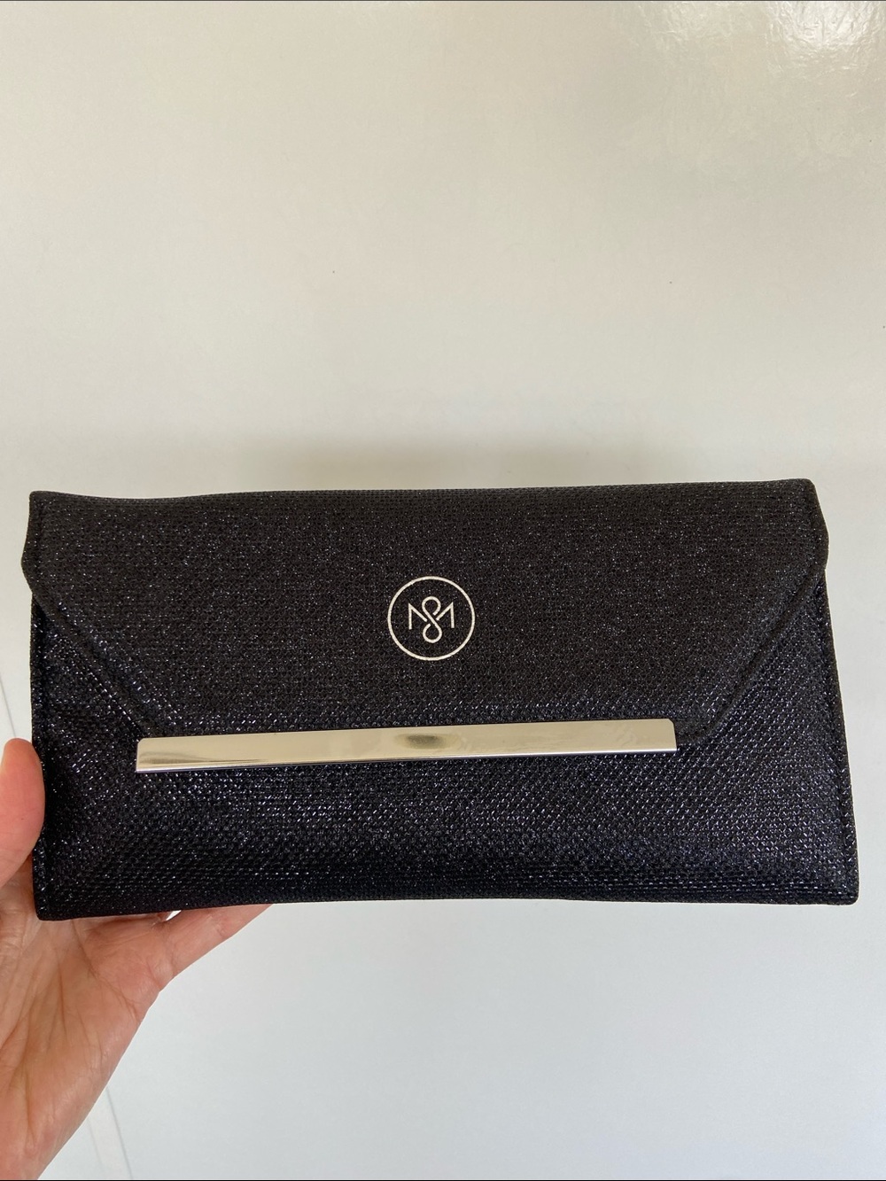 Young Living Black Clutch with Silver Bar Detail